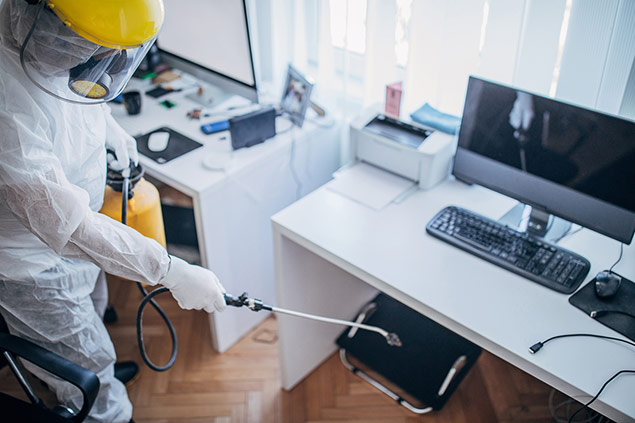 photo of electrostatic cleaning an office